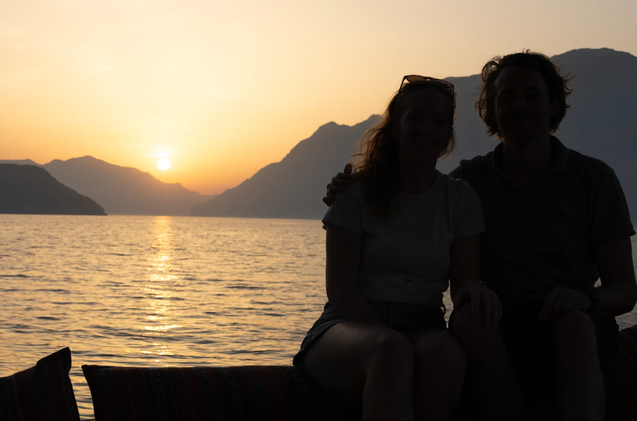 Photo of couple in front of sunset - actually visible unlike in the original